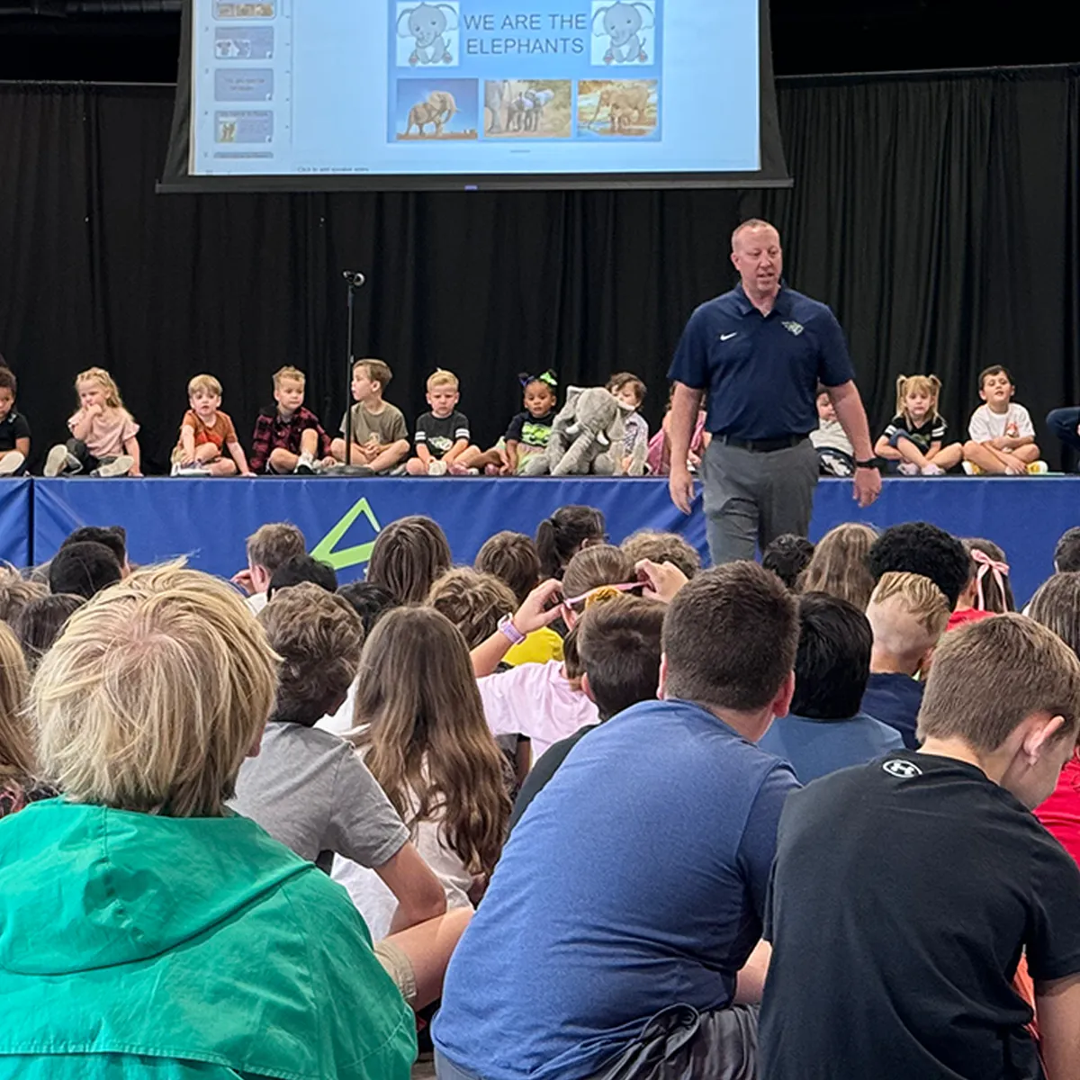 Preschool students participating in an all-school assembly with the Summit School community.