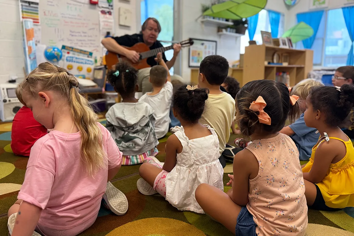 Summit School preschool students participating in a music experience