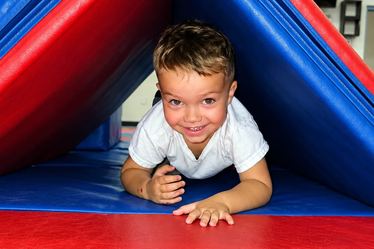 Summit preschool student building coordination and confidence during physical education