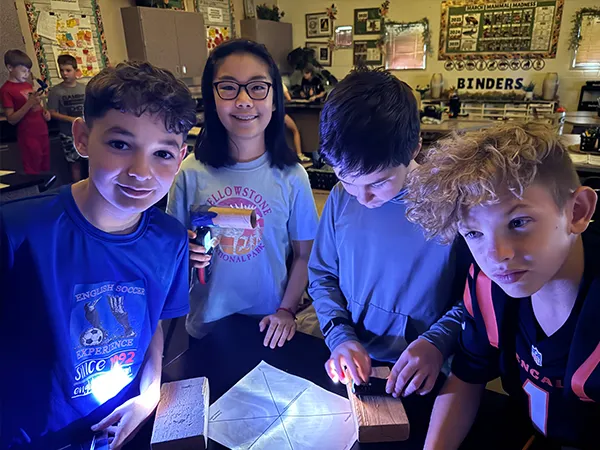 summit-school-ahwatukee-hands-on-science Summit School students exploring a hands-on science activity together.