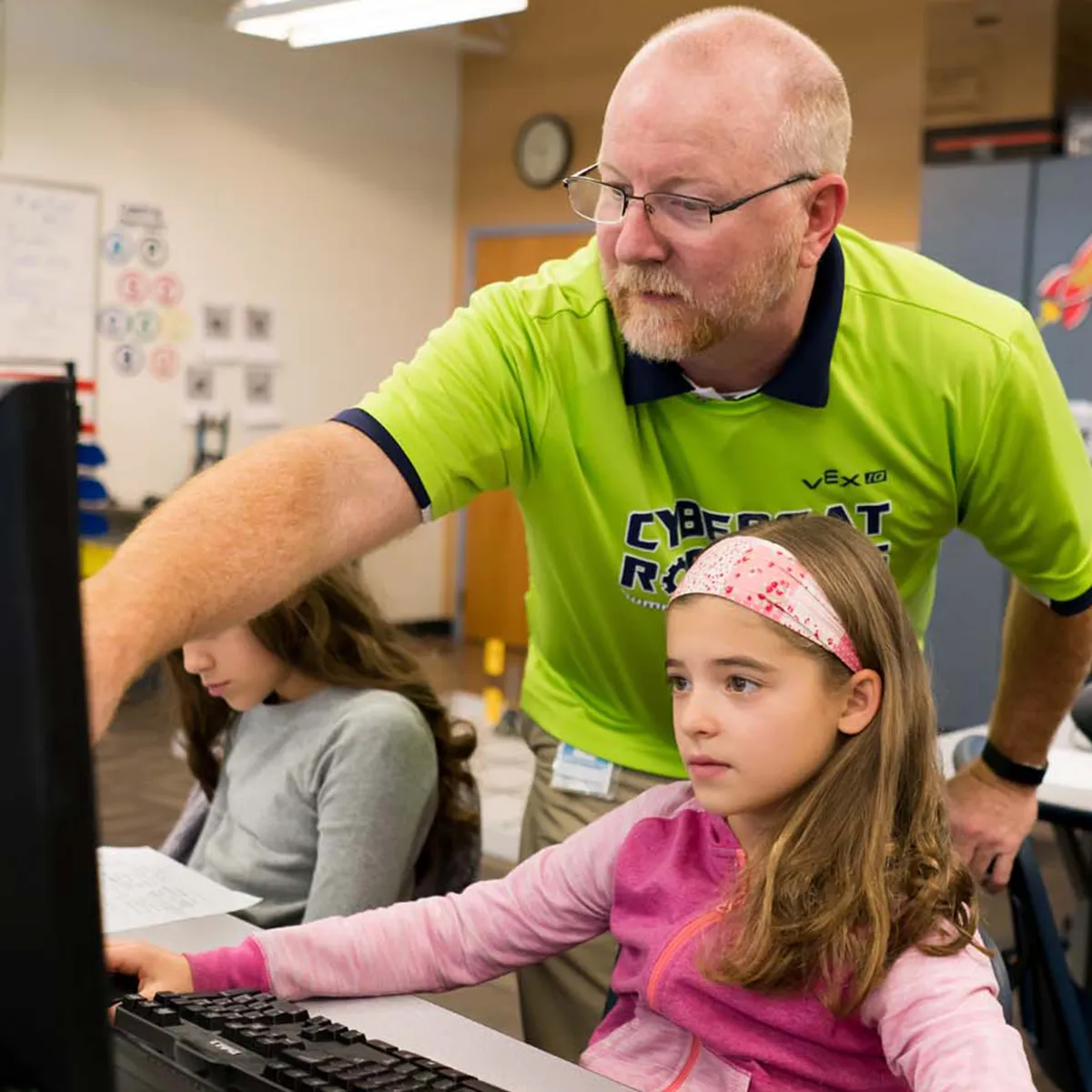 Summit School students explore programming and robotics during an after-school enrichment activity.