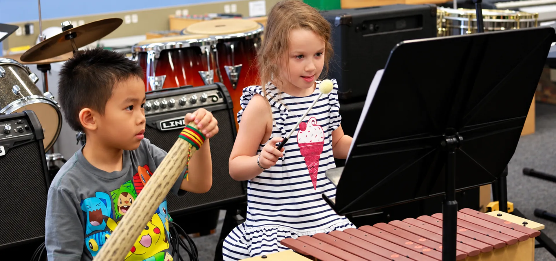 summit-elementary-specials-music Elementary students explore musical instruments during music class at Summit School in Ahwatukee.