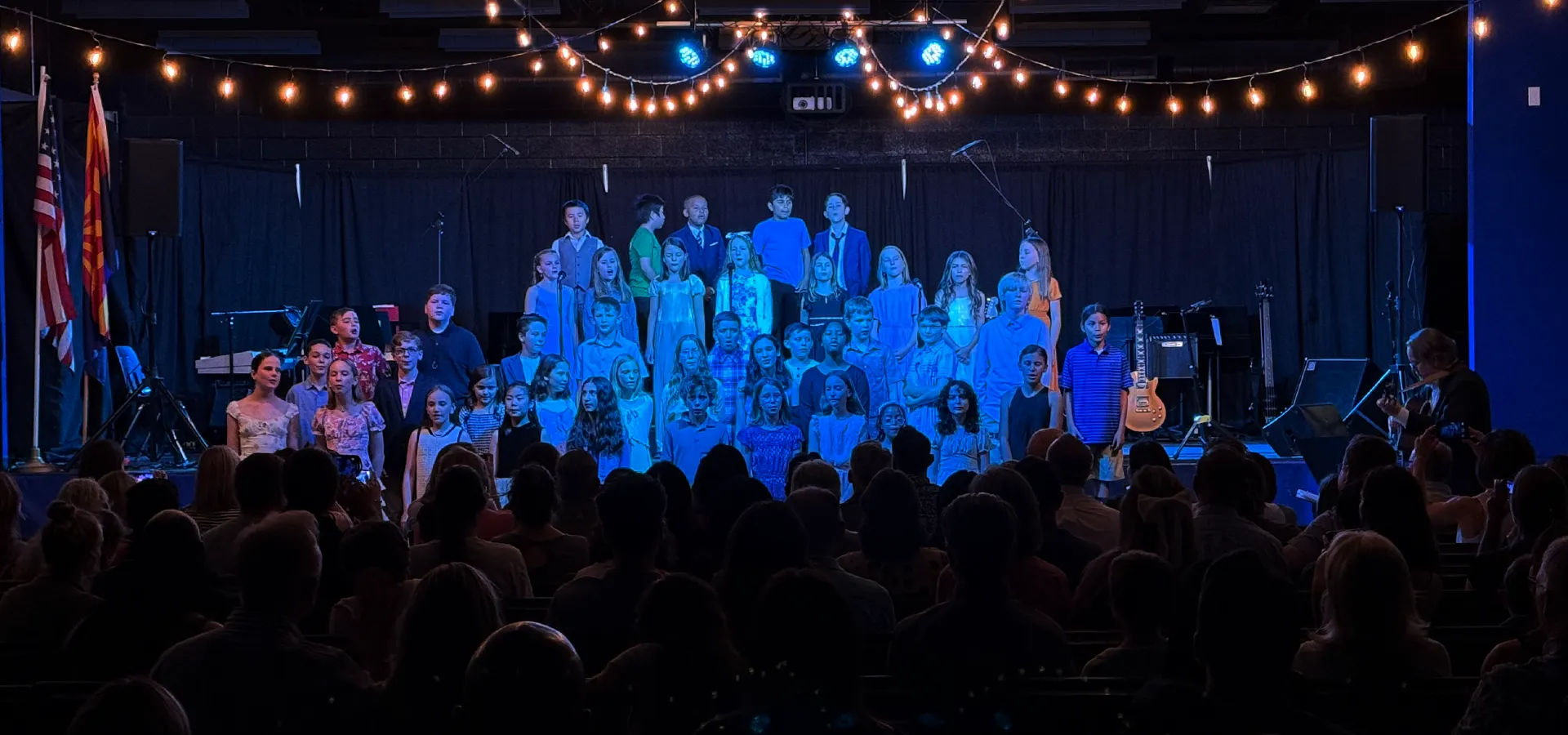 summit-elementary-specials-student-performance Summit School students perform together on stage for families during a school music performance in Ahwatukee.