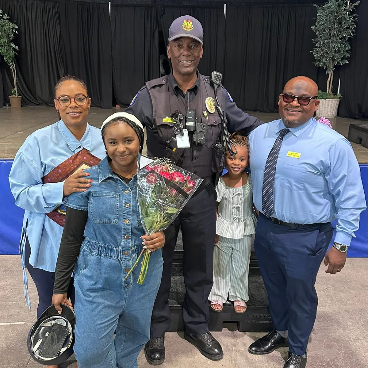 Summit School ROPES student with her community mentor and family.