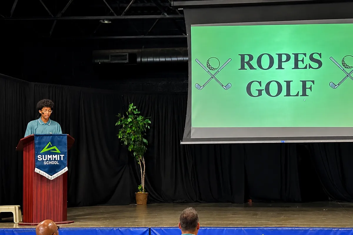 Summit School eighth-grade student presenting his ROPES project on golf.